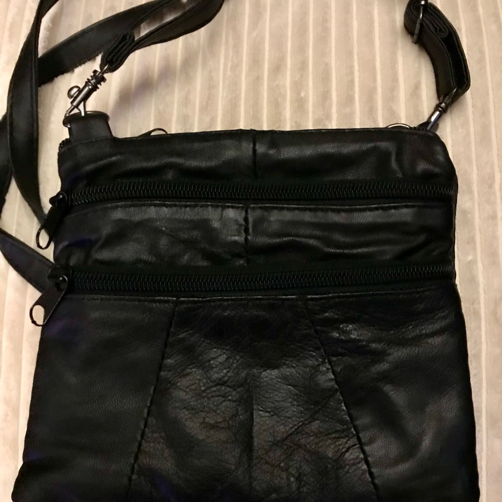 Harley Davidson riding purse small leather crossbody, or clips on waist.